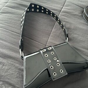 This is a black grunge bag that is from SHEIN.